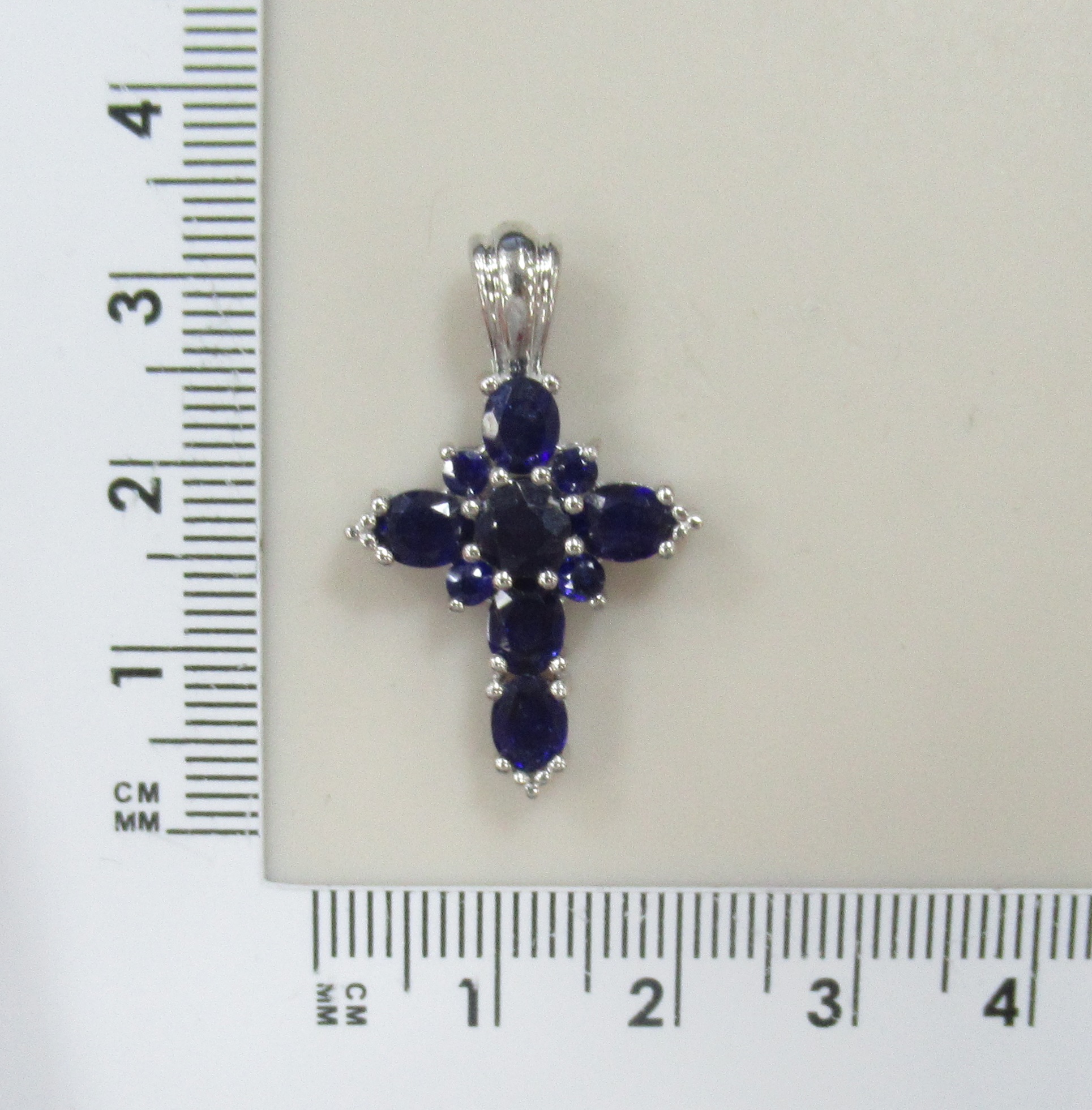 Серебряная подвеска-крест с сапфирами